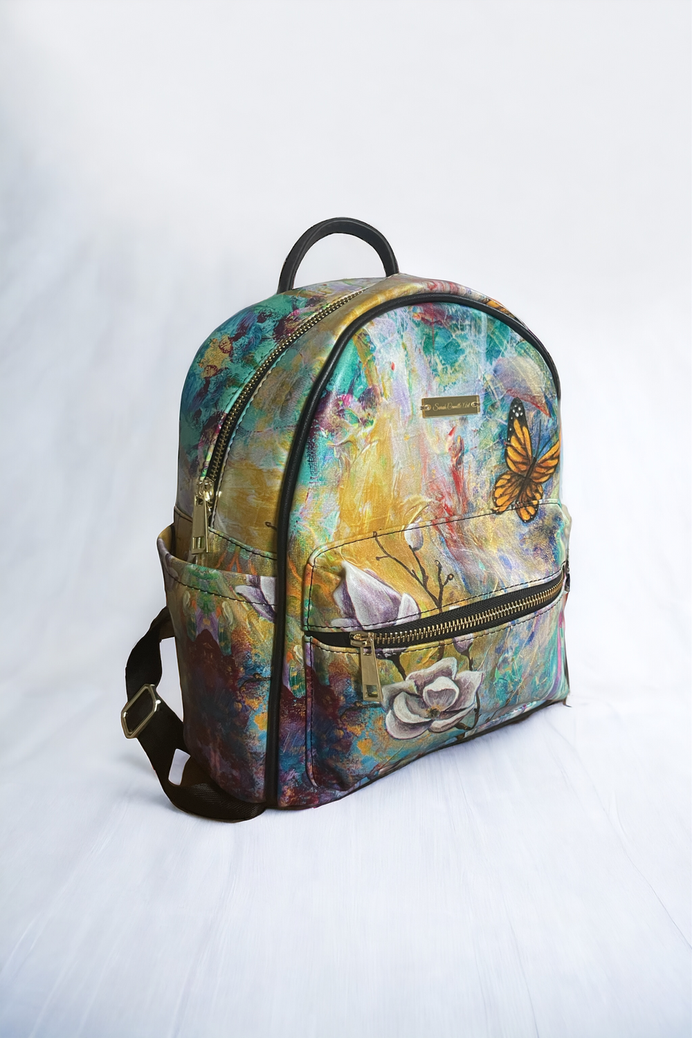 The Behold Collection Mini Backpack